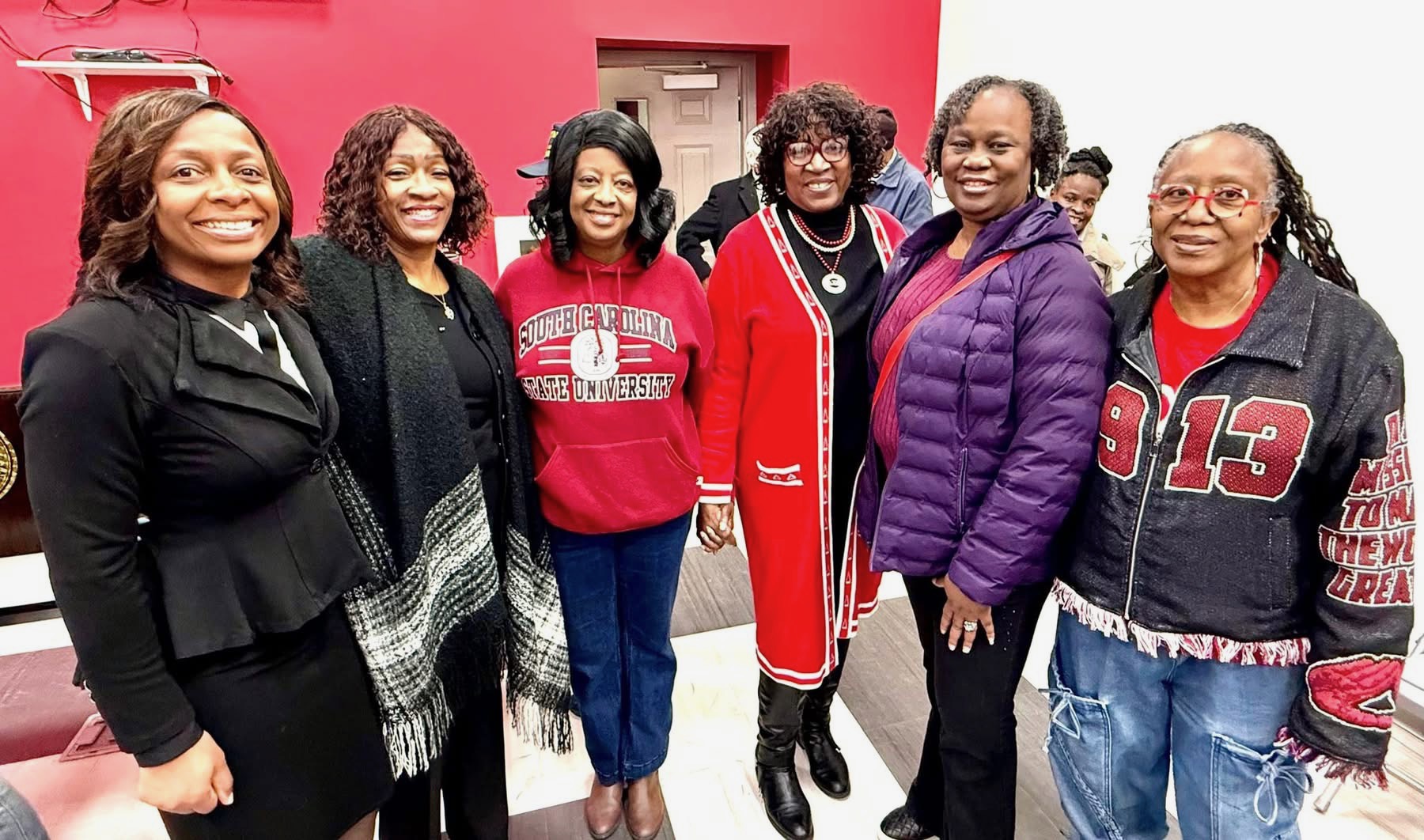 Delaney with community members