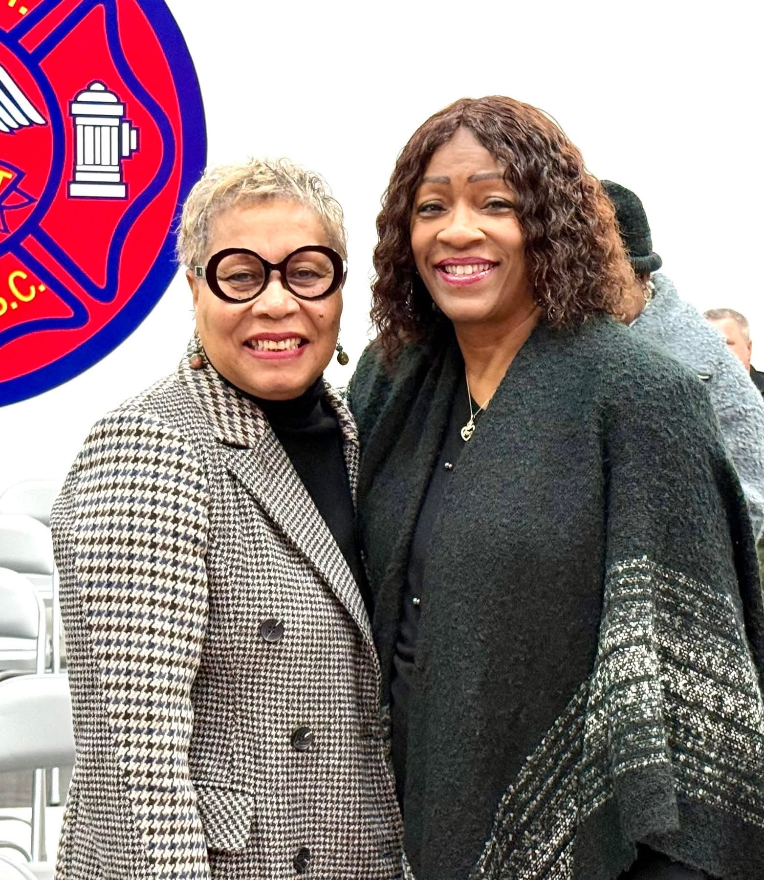 Delaney with supporter at fire station